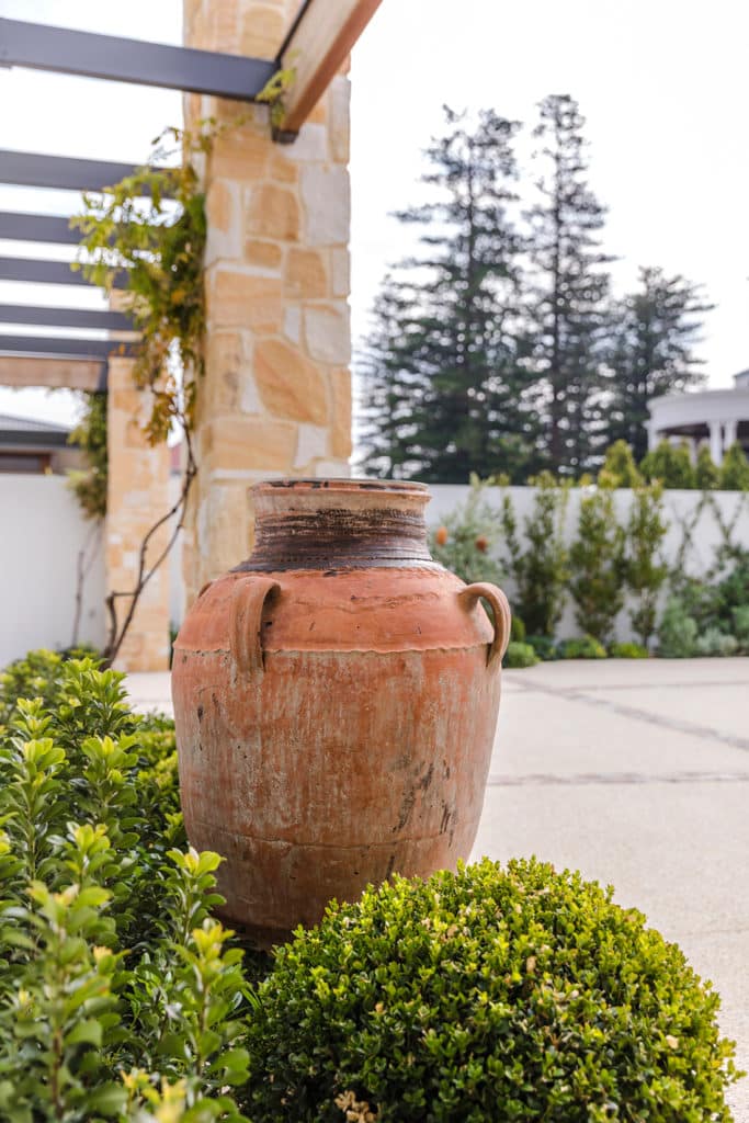 detail photo of a rustic mediterranean vase garden accessory.