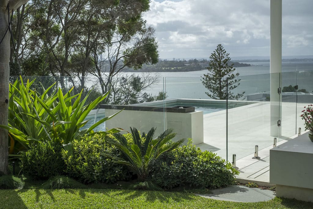 A landscaped pool area overlooking Mosman bay.