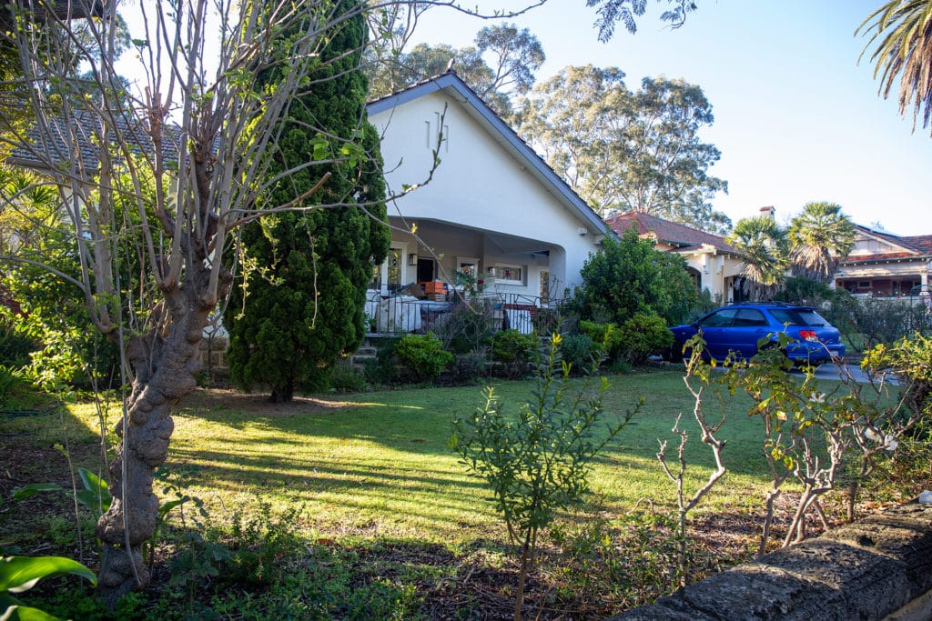 a photo of the Nedlands residence and garden before TDL service